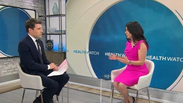 Black Halo Jackie O Sheath Dress worn by Celine Gounder as seen in CBS Mornings on February 17, 2025