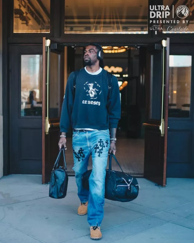 Chrome Hearts Black Allover Cross Patches XL Duffle Bag worn by Naz Reid on the Instagram account @timberwolves