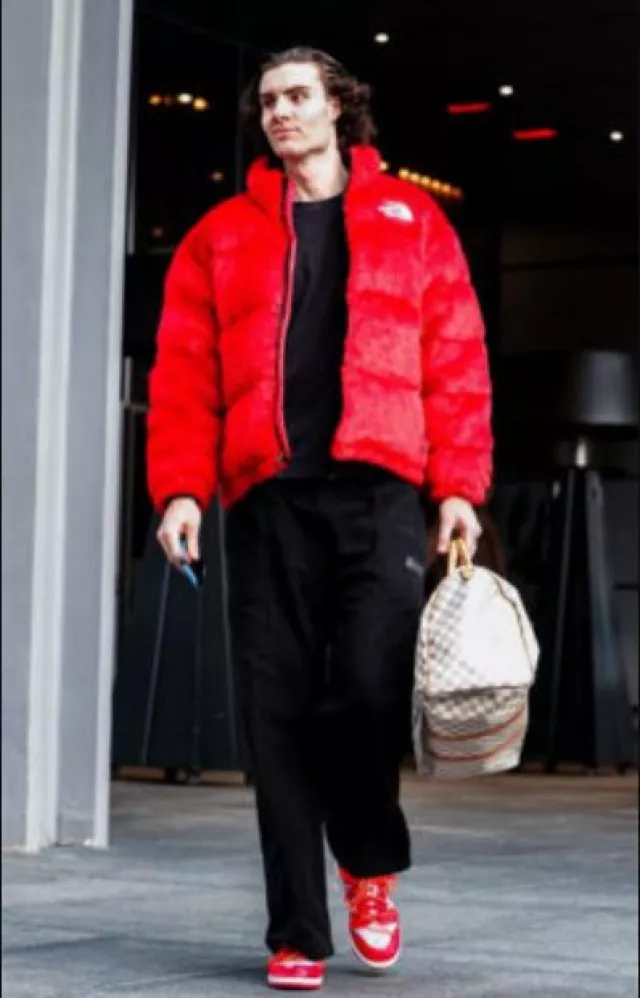 Supreme The North Face Red Fur 'Nuptse' Down Jacket worn by Josh Giddey on the Instagram account @chicagobulls