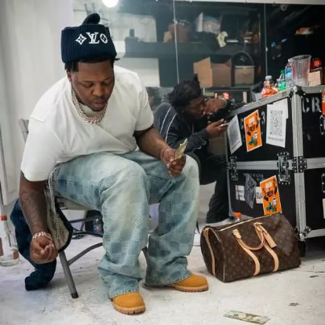 Louis Vuitton Brown Monogram Keepall 45 Bag worn by Lil Zay Osama on the Instagram account @lilzayosama