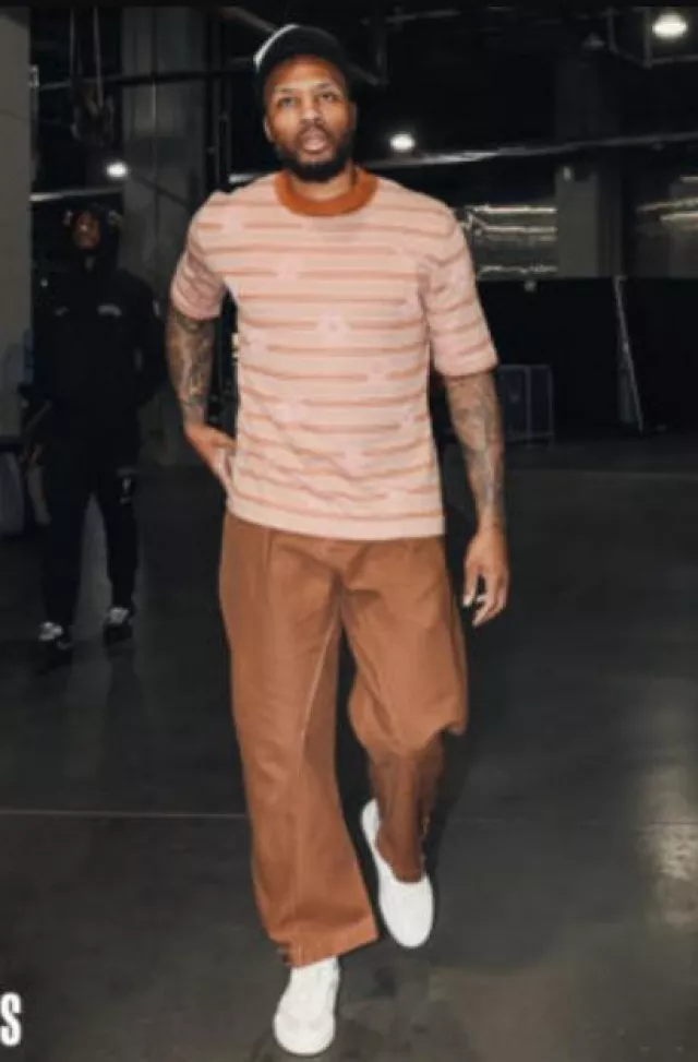 JW Anderson Brown Twisted Seam Pants worn by Damian Lillard on the Instagram account @bucks