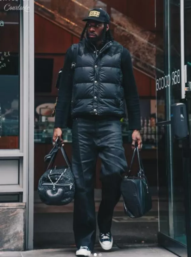 Chrome Hearts Black Allover Cross Patches XL Duffle Bag worn by Naz Reid on the Instagram account @timberwolves