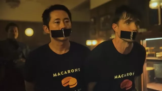 Macarons are not a Sin Tee Yellow Version T-Shirt worn by Timo (Steven Yeun) in Mickey 17