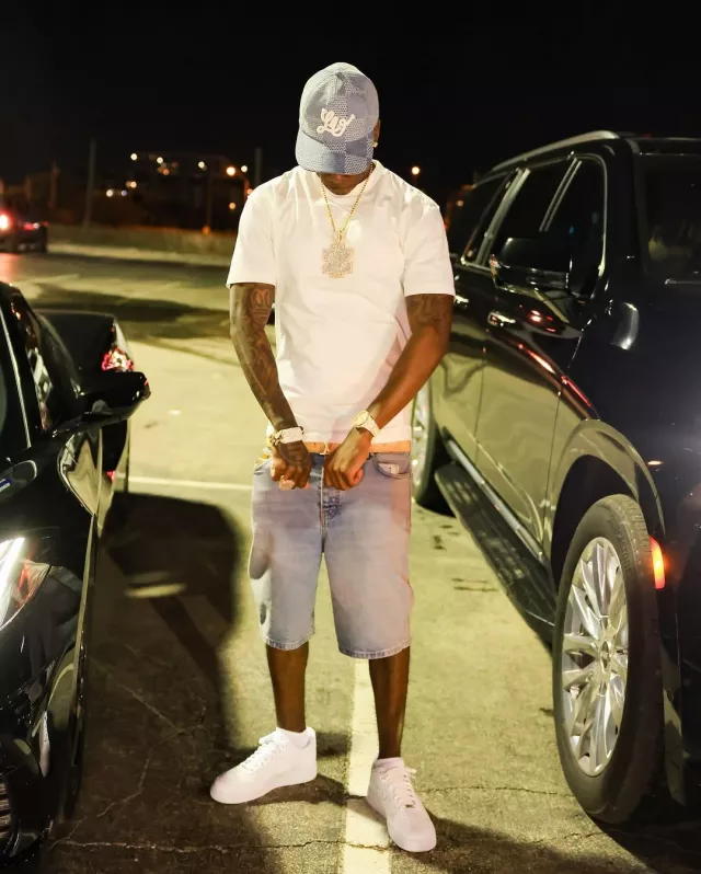 Louis Vuitton Beige Monogram Raffia 'LV Initiales' Belt worn by Zillionaire Doe on the Instagram account @zillionairedoe