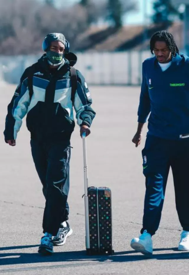 Supreme Black Side-Zip Logo Trackpants worn by Rob Dillingham on the Instagram account @timberwolves
