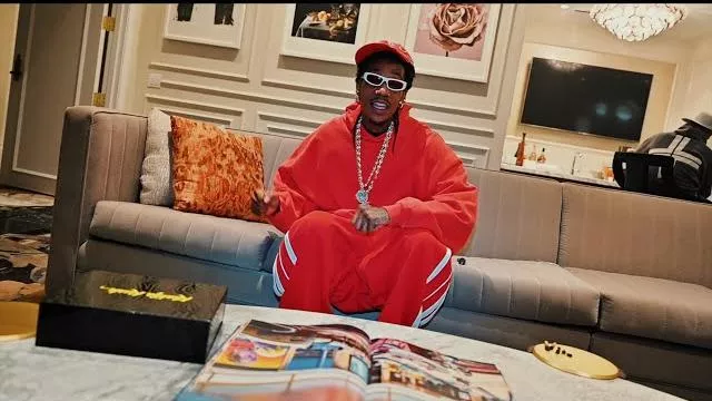 Vetements Red V-Oval Baggy Sweatpants worn by Wiz Khalifa in Wiz Khalifa, Sledgren - Bigger Boat [Official Music Video]