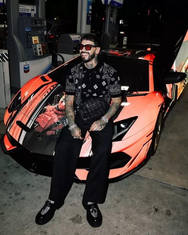 Amiri Black Sequin Boucle Camera Bag worn by Anuel AA on the Instagram account @alexvisualss