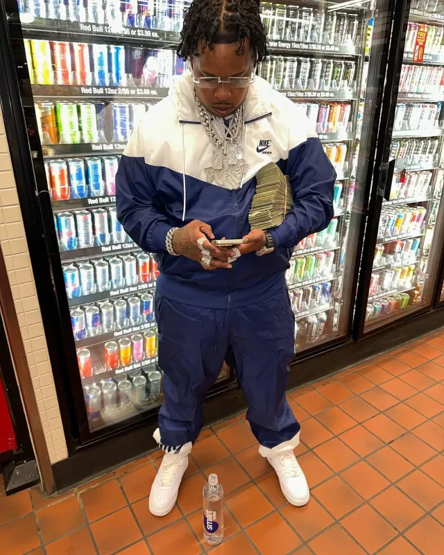 Nike White & Navy Split 'Windrunner' Jacket worn by Finesse2tymes on the Instagram account @1finesse2tymes