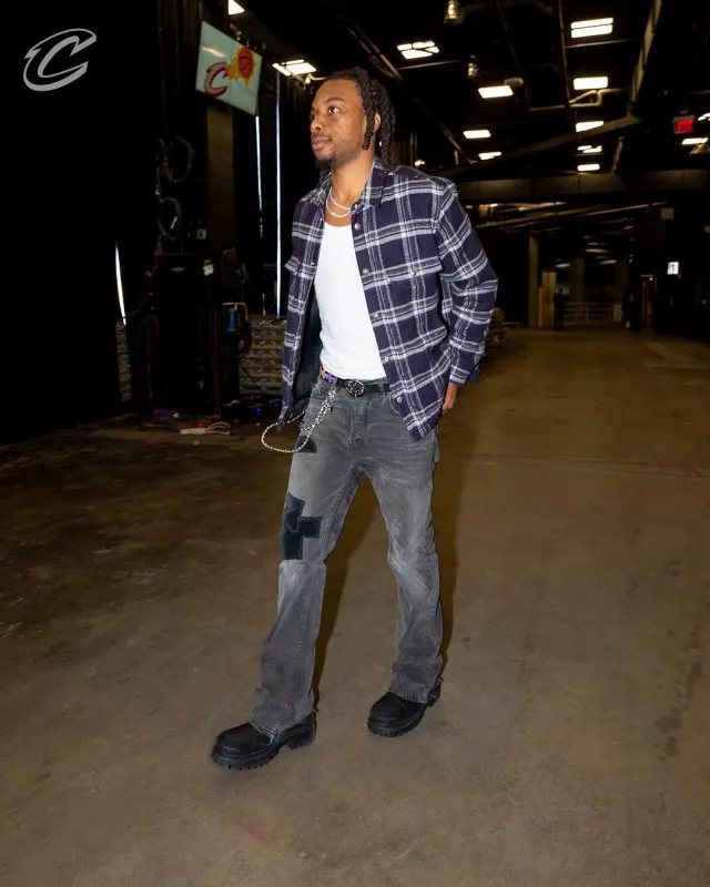 Balenciaga Black Distressed Canvas 'Strike' Boots worn by Darius Garland on the Instagram account @cavs