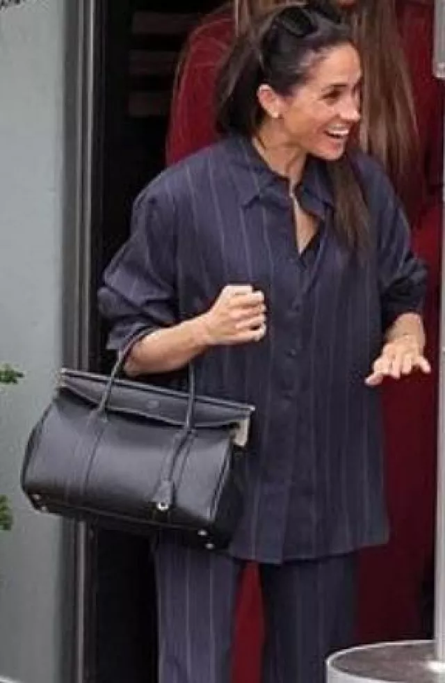 Loro Piana Loom L32 Bag in Black Smooth Calfskin worn by Meghan Markle at Lunch with Serena Williams at Tre Luna on March 1, 2025