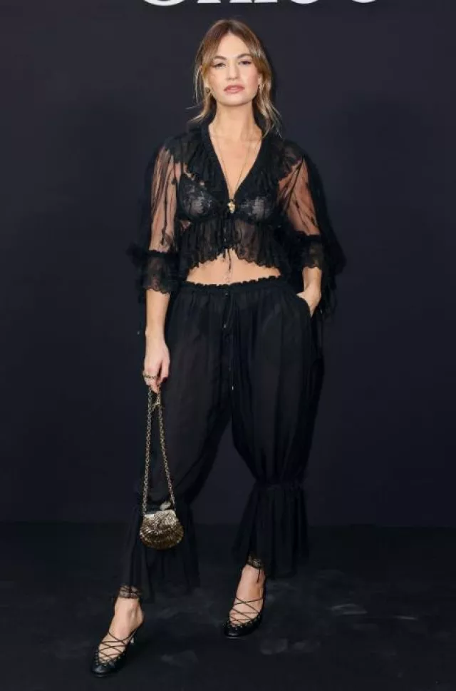 Chloe Ruffled Embroidered Lace Top worn by Lily James at Chloe Show on March 6, 2025