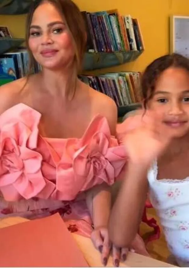 Aje Taffeta Crop Top worn by Chrissy Teigen on Her Instagram Story post on April 11, 2025