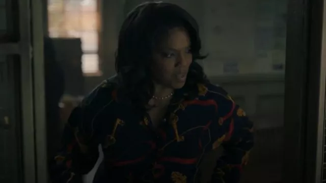 Ellen Tracy Navy Blue Silk Key Cord Chain Blouse worn by FOS Officer Mary Jo Hayes (Tyla Abercrumbie) as seen in NCIS: Origins (S01E12)
