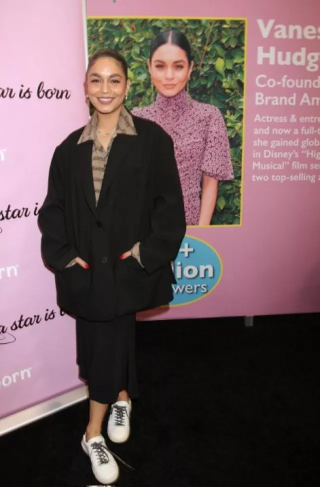 Saint Laurent Andy Low Top Sneakers worn by Vanessa Hudgens at Licensing Expo Trade Show on May 21, 2025