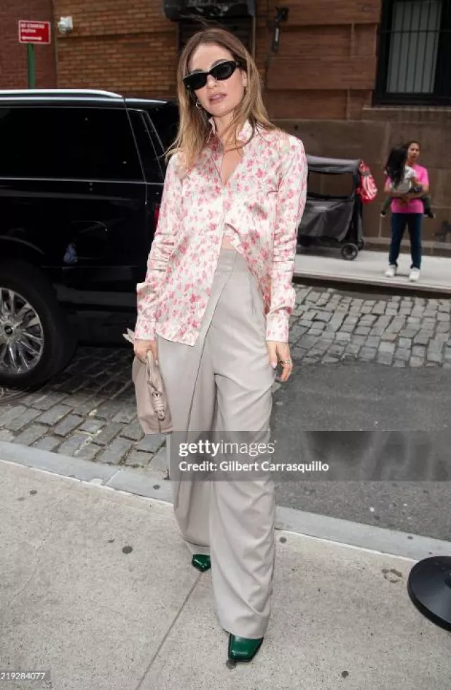 Loewe Medium Flamenco Clutch in Nappa Calfskin worn by Lily James at Tribeca Film Festival on June 8, 2025