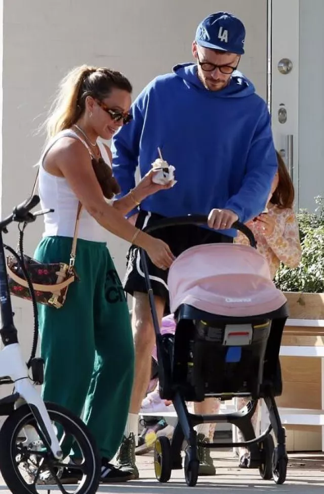 Louis Vuitton x Takashi Murakami Side Trunk worn by Hilary Duff in Los Angeles on June 8, 2025