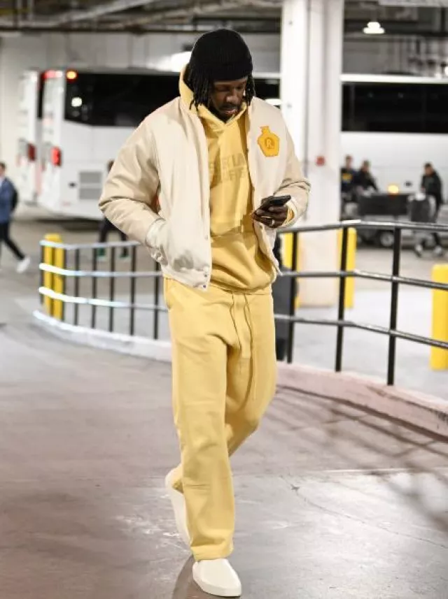 Fear Of God Light Tuscan Yellow Hoodie worn by Jrue Holiday on the Instagram account @celtics