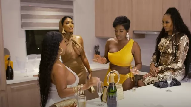 Saint Laurent Robe en jersey dos nu à capuche dos nu portée par Brit Eady comme on le voit dans The Real Housewives of Atlanta (S16E14)