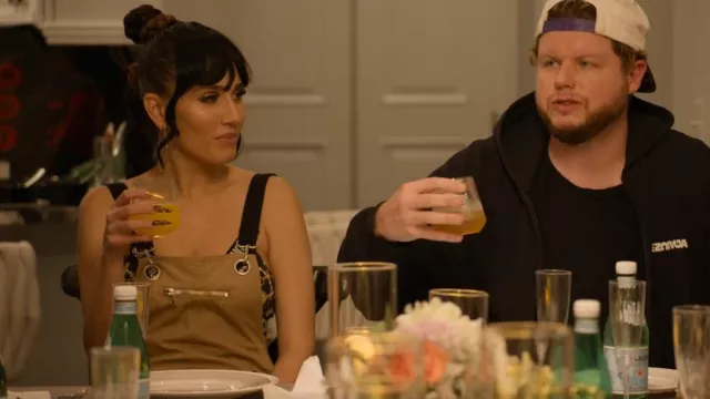 Moschino x H&M Black Chain Print Logo Band Bralette worn by Jenna Andrews as seen in Hitmakers (S01E03)