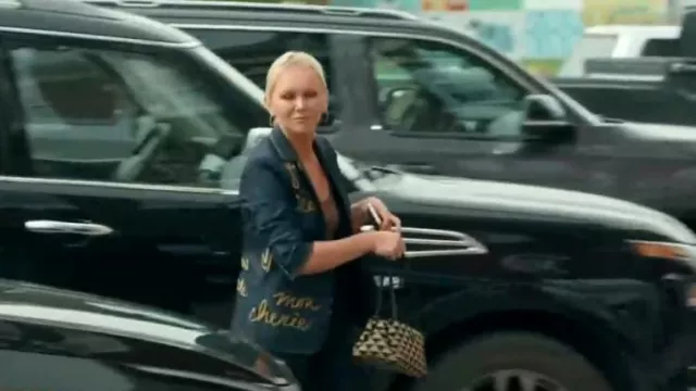 Prada Triangolo Jacquard Shoulder Bag worn by Galyna Saltkovska as seen in The McBee Dynasty: Real American Cowboys (S02E06)