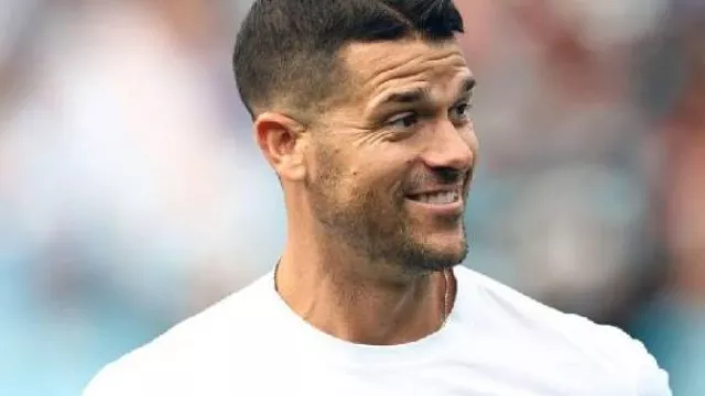 Carolina Panthers Long Sleeve White T-Shirt worn by Dave Canales in the YouTube video Carolina Panthers vs. Houston Texans Game Highlights | 2025 Preseason Week 2