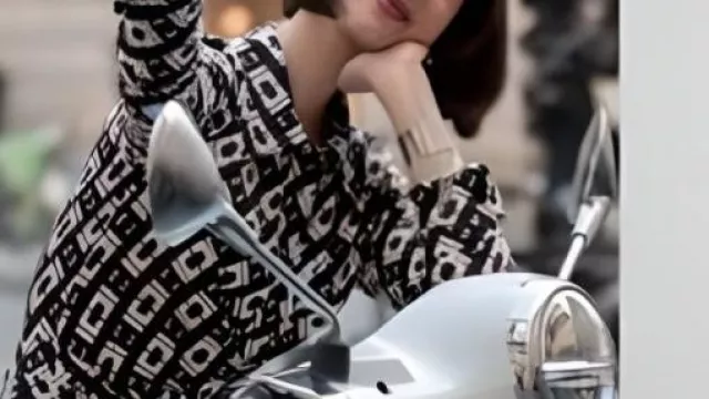 Chain Print Jumpsuit worn by Emily Cooper (Lily Collins) in TV Series Emily In Paris S05