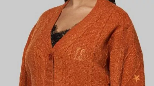 The Life Of A Showgirl Cardigan worn by Taylor Swift in Taylor Swift’s Life of a Showgirl Coming to Theaters for Release Party | E! News