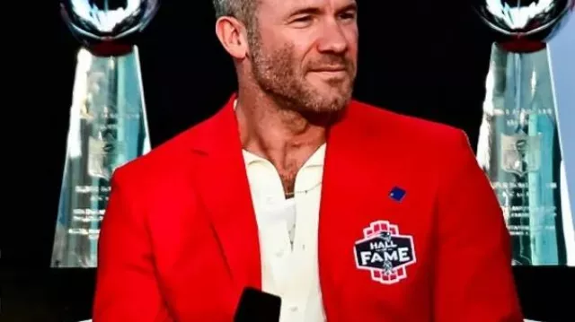 New England Patriots 2025 Hall of Fame Red Coat of Julian Edelman in Julian Edelman Puts on his Patriots Hall of Fame Red Jacket | Press Conference