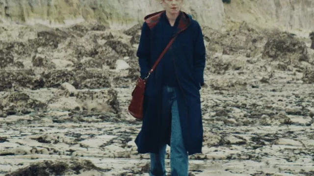 Navy coat of Agathe (Camille Rutherford) in Jane Austen Wrecked My Life