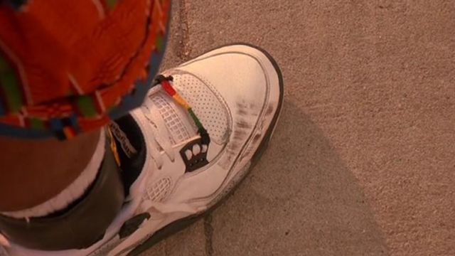 The pair of Nike Air Jordan 4 Buggin Out (Giancarlo Esposito) in Do The Right Thing