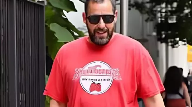 Adam Sandler “Strawberries Records & Tapes” T-Shirt worn by Self (Adam Sandler) as seen in Adam Sandler: Love You