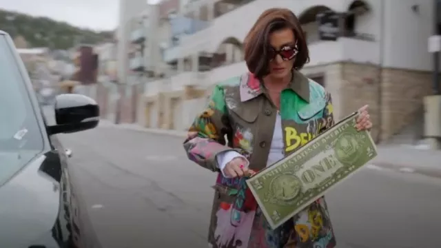 Moschino Leather Clutch Bag worn by Bronwyn Newport as seen in The Real Housewives of Salt Lake City (S06E04)