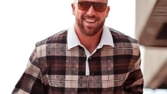 Monogram Flannel Plaid Polo Shirt worn by Travis Kelce in Travis Kelce Gets Decked in Velvet for the Chiefs' Game Against the Raiders: See His Festive Fit