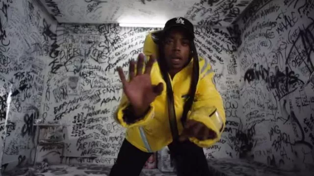 Undercover Yellow Astro Puffer Jacket worn by Boogie in WESTSIDE BOOGIE - Rainy Days ft. Eminem