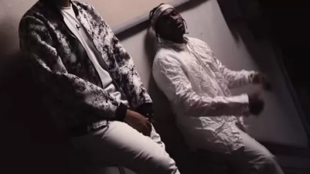 Kanghyuk White Airbag Pants porté par Pusha T à Cordae - Nightmares Are Real (feat. Pusha T) [Official Music Video]