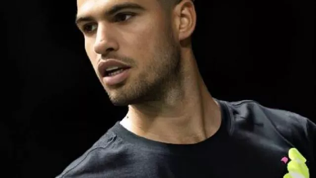 Paris ATP Masters 1000 Tennis Tournament Black Graphic T-Shirt worn by Carlos Alcaraz in Head-to-Head Carlos Alcaraz vs Cameron Norrie | Rolex Paris Masters