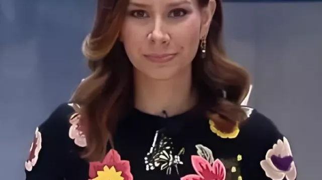 Rebecca Jarvis Black Floral Embroidered Sweater worn by Rebecca Jarvis as seen in Good Morning America