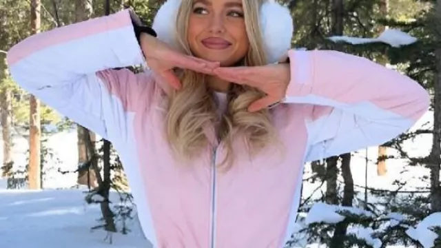 Pink Snow Suit worn by Self - Judge (Melissa Peterman) as seen in Finding Mr. Christmas (S02E01)