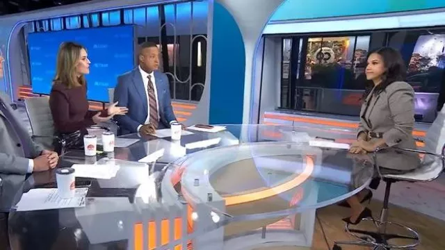 LK Bennett Laurie Pleated Faux Leather Midi Skirt worn by Laura Jarrett as seen in Today on November 19, 2025