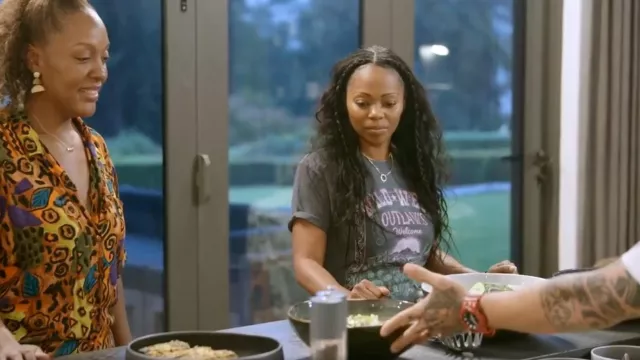 Mud & Moo Boutique Wild West Graphic Tee worn by Sparkle Clark as seen in Tiffany Haddish Goes Off (S01E02)