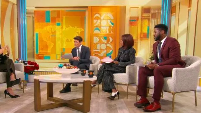 Ulla Johnson Carine Pinstriped Wool-blend twill Wide-leg Pants worn by Gayle King as seen in CBS Mornings on December 3, 2025