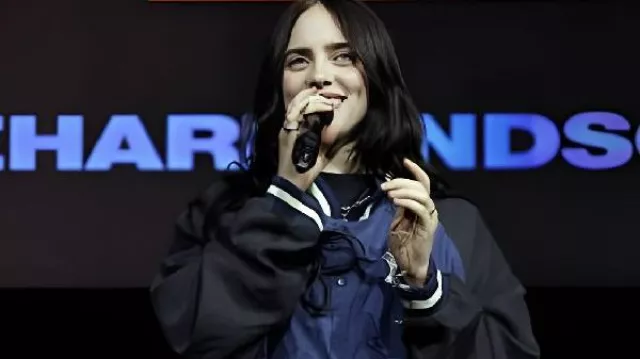 Billie Eilish “Hit Me Hard And Soft” Letterman Jacket in the music video Billie Eilish - THE GREATEST (Live from The Late Show with Stephen Colbert, 2024)