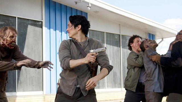 The pistol to Glenn (Steven Yeun) in The Walking Dead
