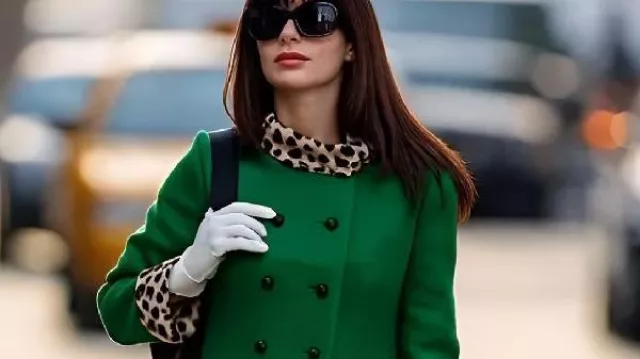 green emerald velvet dress The Devil Wears Prada 8x10 Photo Anne Hathaway on Telephone in Green Dress  Sunglasses on Head kn at Amazon's Entertainment Collectibles Store