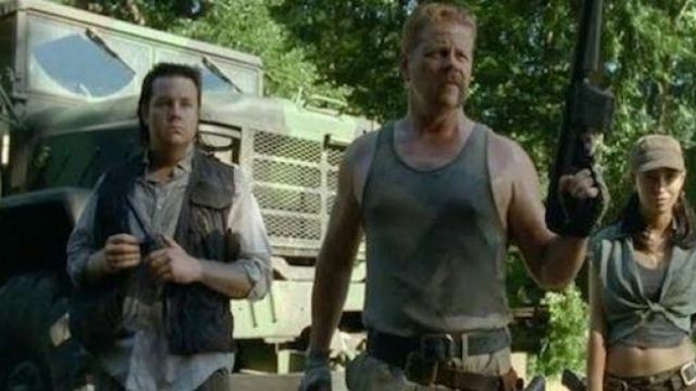 The shirt is gray and Eugene (Josh McDermitt) in The Walking Dead