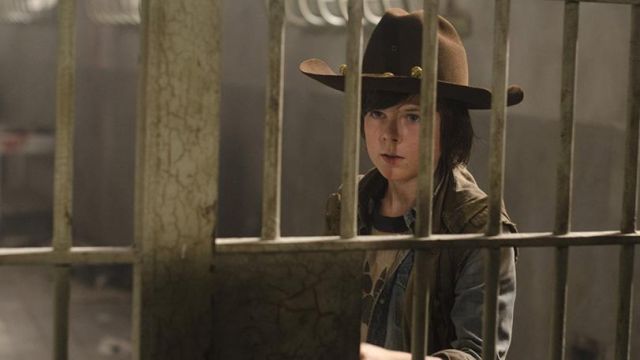 The jacket beige, without the handle, Carl Grimes (Chandler Riggs) in The Walking Dead S03E02