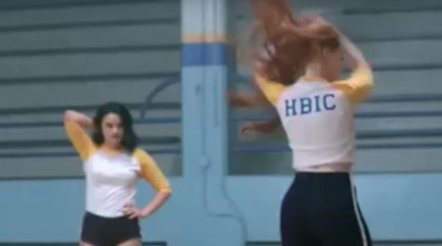 HBIC Raglan white and yellow long sleeve tee worn by Cheryl Blossom (Madelaine Petsch) as seen in Riverdale (S01E11)