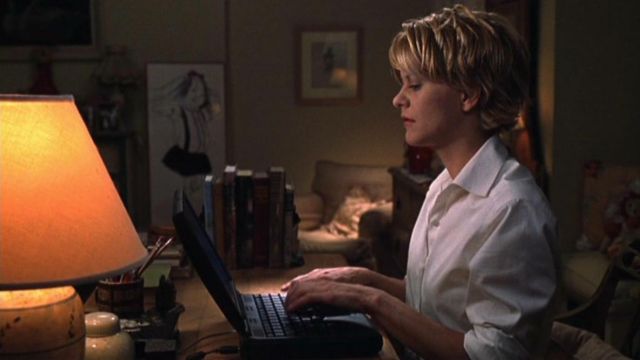 The computer Apple Powerbook 3400 Kathleen Kelly (Meg Ryan) in You've got a message