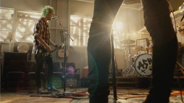 The Converse black Michael Clifford in the clip Amnesia by 5 Seconds Of Summer