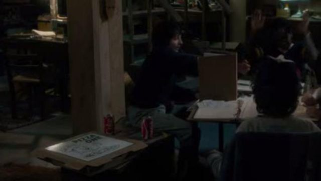 Cans of Coca-Cola at Mike Wheeler (Finn Wolfhard) in Stranger Things S01E01